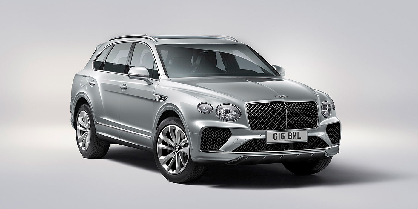 Bentley Cairo Bentley Bentayga in Moonbeam paint, front three-quarter view, featuring a matrix grille and elliptical LED headlights.