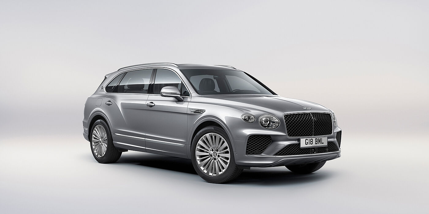 Bentley Cairo Bentley Bentayga Extended Wheelbase luxury SUV front three quarter view in Moonbeam paint with 21 inch five spoke painted wheels