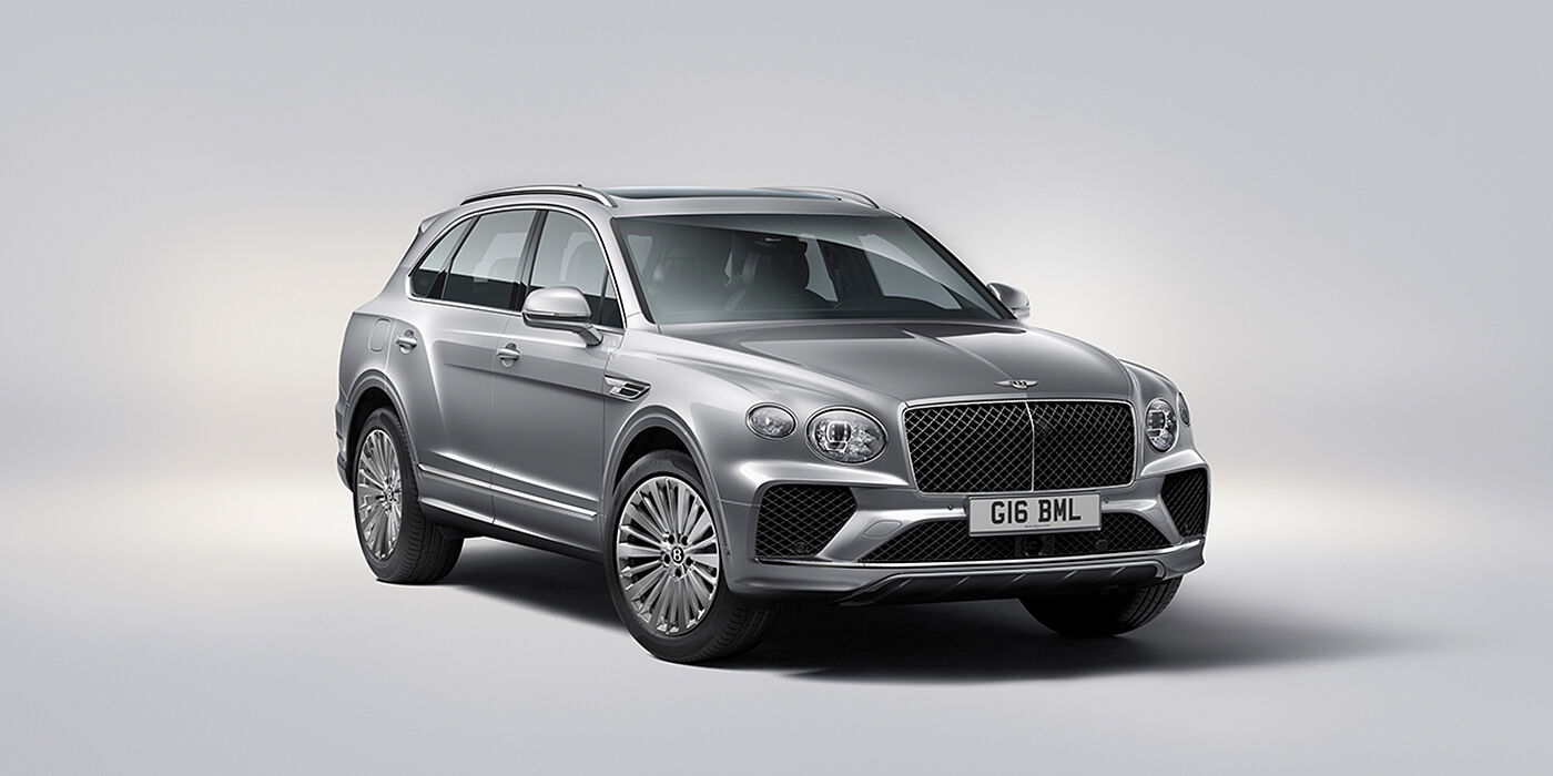 Bentley Cairo Bentley Bentayga luxury SUV front three quarter view in Moonbeam paint with matrix grille and 21″ 5 spoke painted wheels