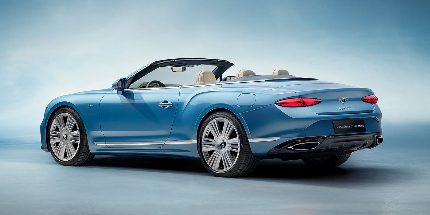 Bentley Cairo New Bentley Continental GTC Azure convertible rear view in Light Windsor blue paint with 22 inch ten spoke wheels and chrome exterior details