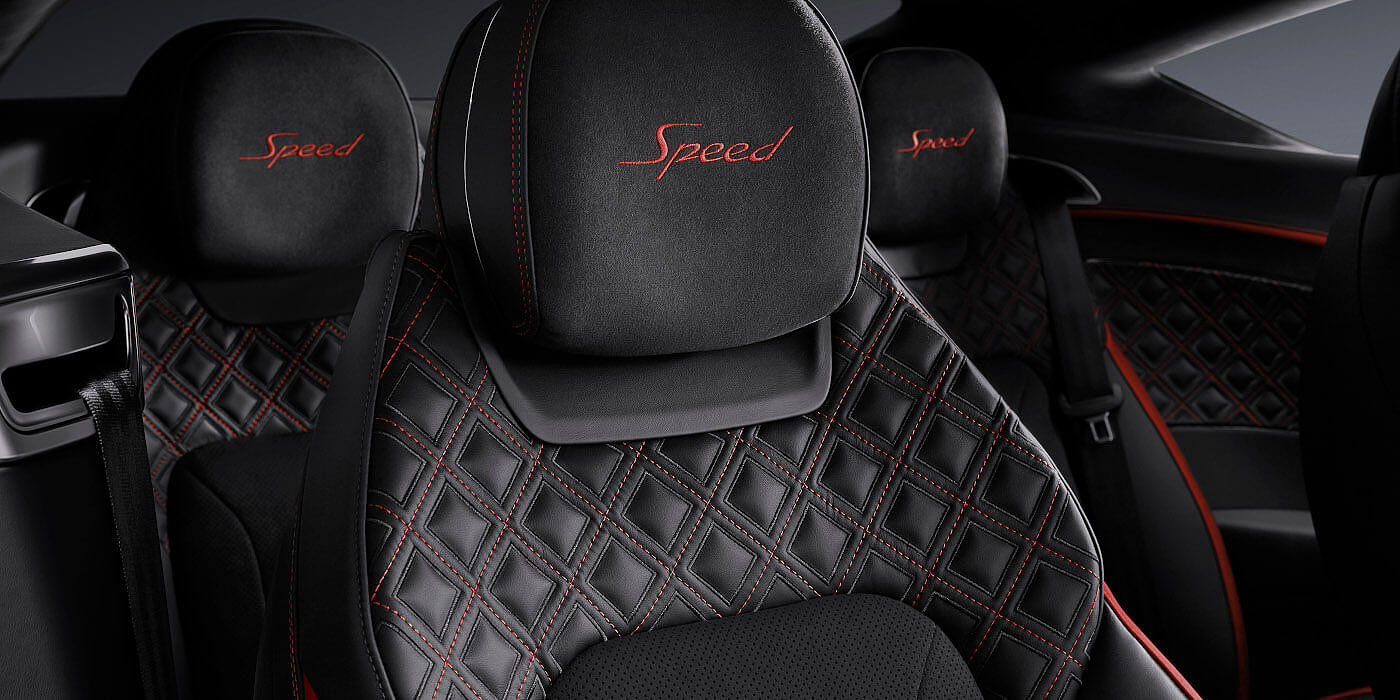 Bentley Cairo Bentley Continental GT Speed coupe seat close up in Beluga black and Hotspur red hide