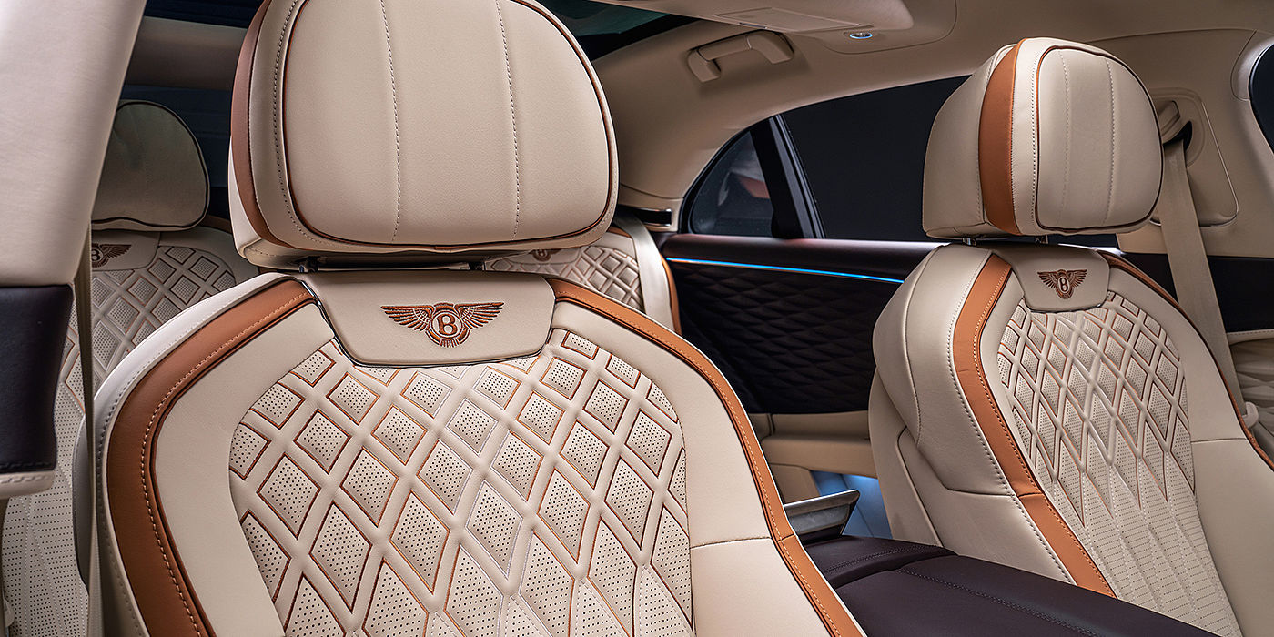 Bentley Cairo Bentley Flying Spur Odyssean sedan rear seat detail with Diamond quilting and Linen and Burnt Oak hides