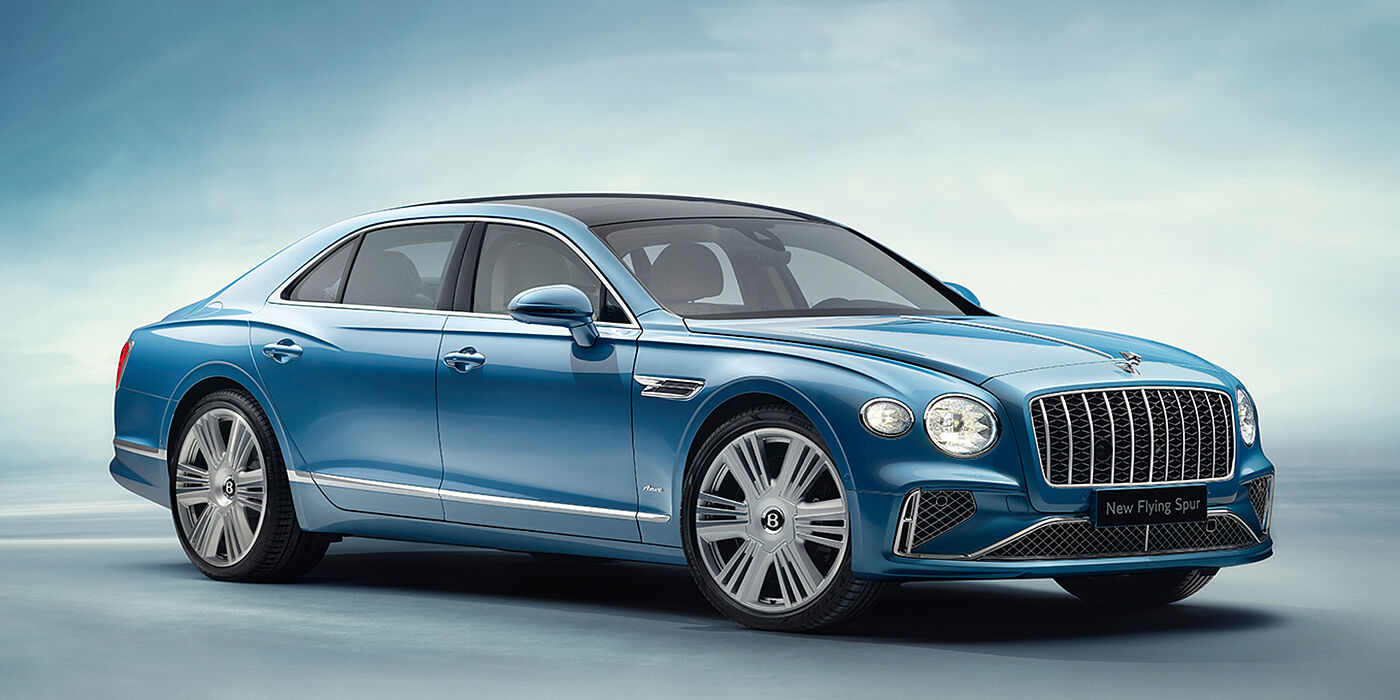 Bentley Cairo New Bentley Flying Spur Azure sedan front view in Light windsor blue by Mulliner paint with 22 inch Azure wheels and chrome exterior details