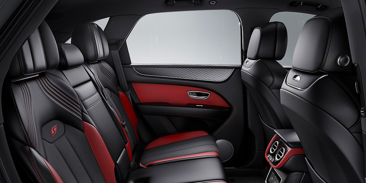 Bentley Cairo Bentey Bentayga S interior view for rear passengers with Beluga black and Hotspur red coloured hide.