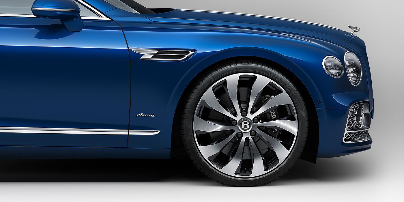Bentley Cairo Bentley Flying Spur Azure sedan side close up in Sequin Blue paint with Azure badge