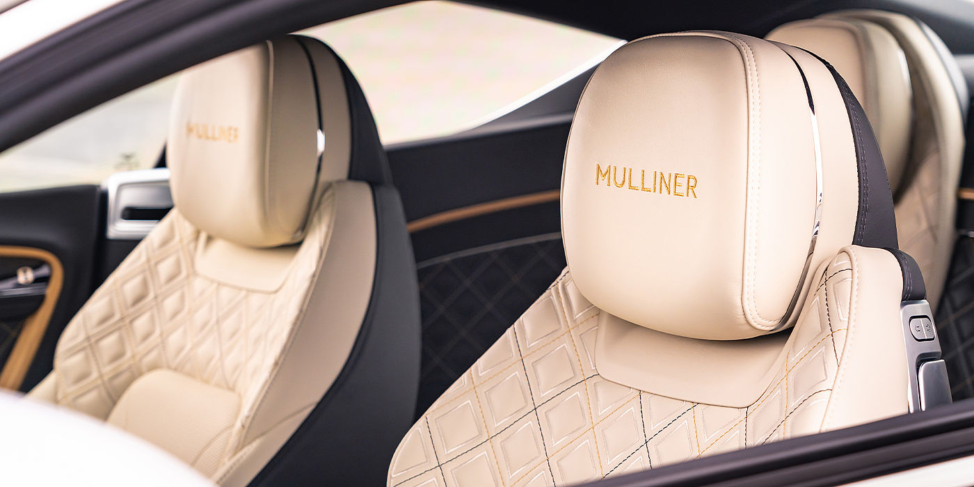 Bentley Cairo Bentley Continental GT Mulliner coupe seat detail in Beluga black and Linen hide