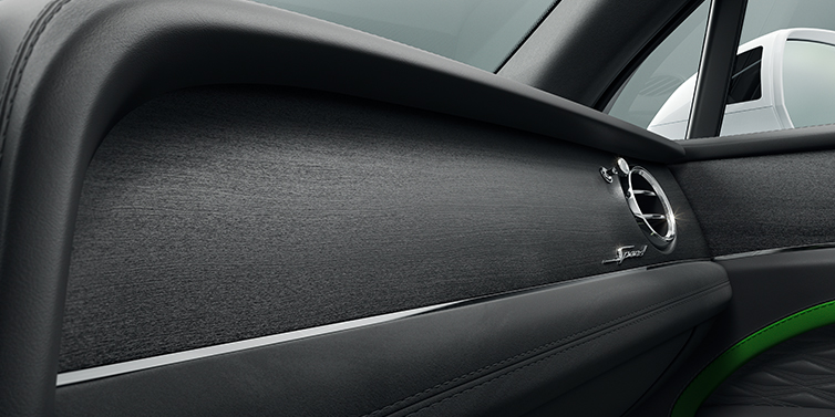 Bentley Cairo Bentley Bentayga Speed SUV front dash close up in Hyper Green and Beluga black hides, with Black Stained Crown Cut Walnut veneer