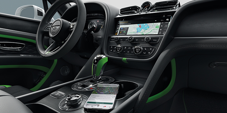 Bentley Cairo Bentley Bentayga Speed SUV front cabin in Hyper Green and Beluga black hides, with Black Stained Crown Cut Walnut veneer